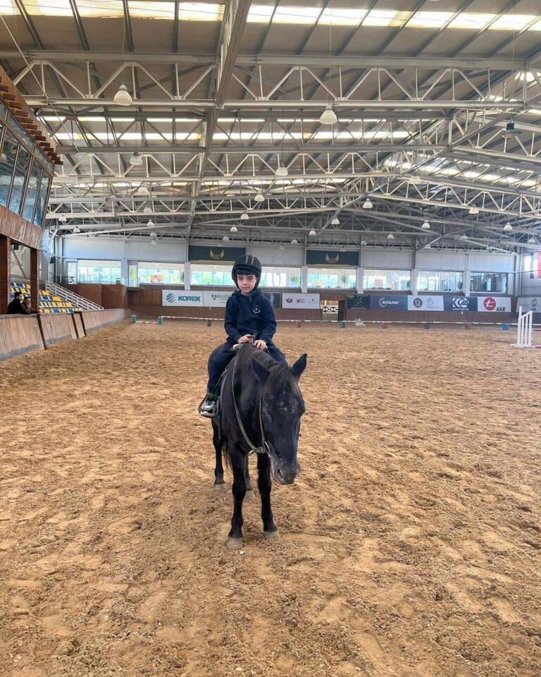 a child riding a horse in a arena, Sanny Private Kindergarten Erbil