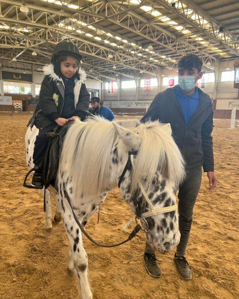 a child riding a horse in a arena, Sanny Private Kindergarten Erbil